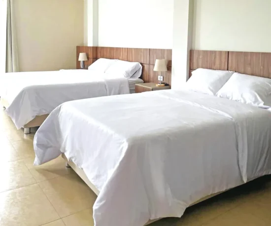 2 camas de la habitación familiar Hotel QC Trujillo