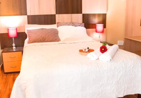 Cama de la Suite Serk'ana Suite Hostal Arequipa