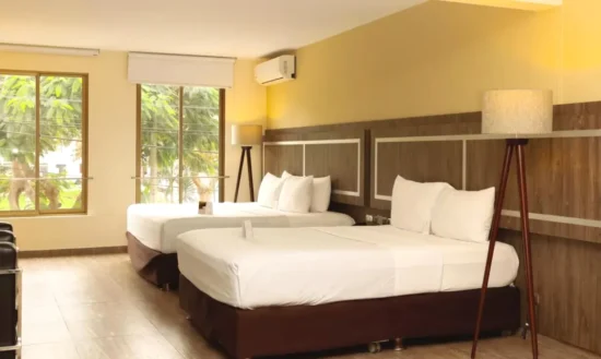 Dos camas en la suite Rado Hotel Quintanas Trujillo